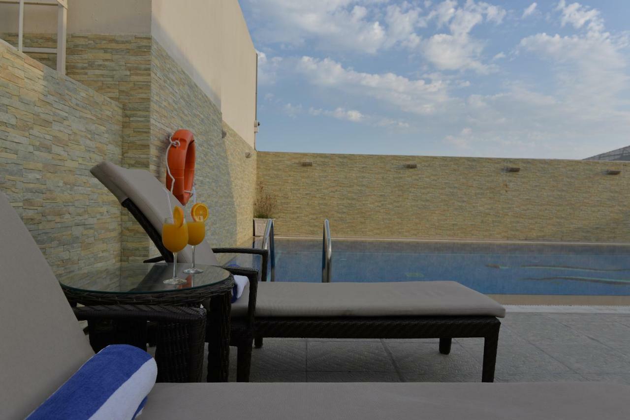 Strato Hotel By Warwick Doha Exterior photo